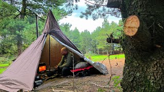 Hot tent camping in overnight rainfall. 