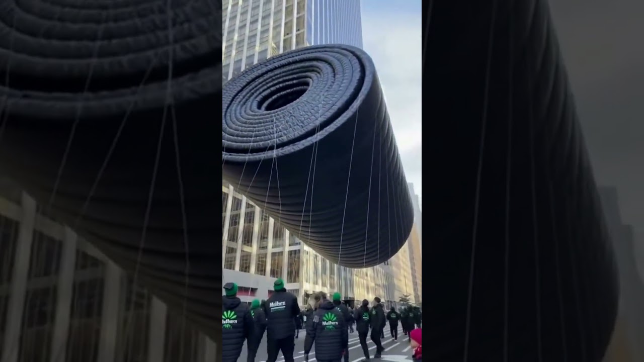 Giant Conveyor Belt Roll Takes Over the Thanksgiving Day Parade (Float Handlers vs the Wind)