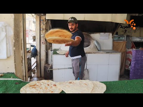 شاهد بالفيديو.. في صيف تموز متاعب تواجه مهنة الخباز  في ذي قار #المربد