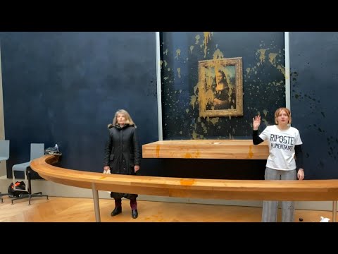 Environmental activists throw soup on glass-protected Mona Lisa in Paris | AFP