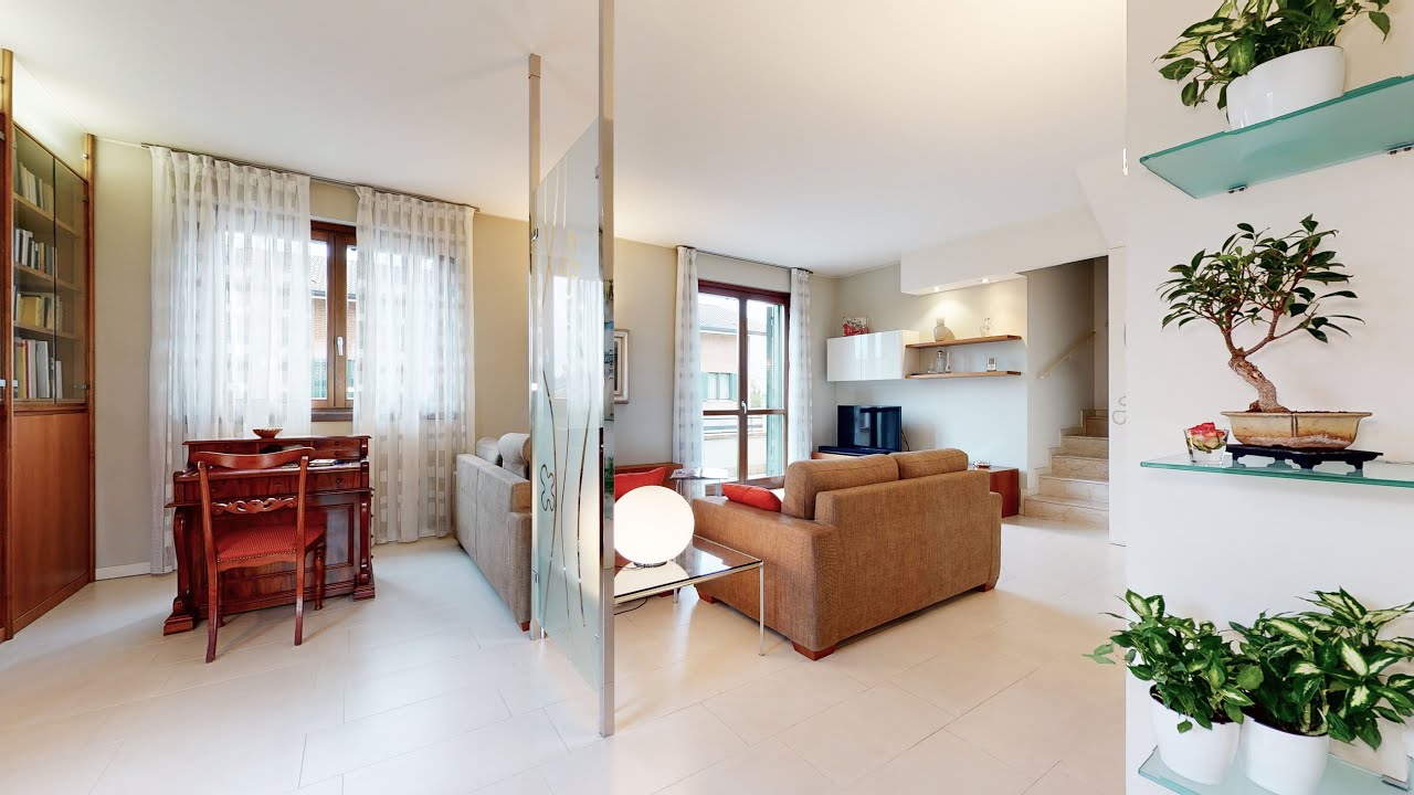 Elegante appartamento con giardino e box doppio