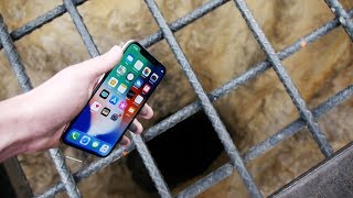 Dropping an iPhone X Down 4000 FT Deep Hole! - What's In There?