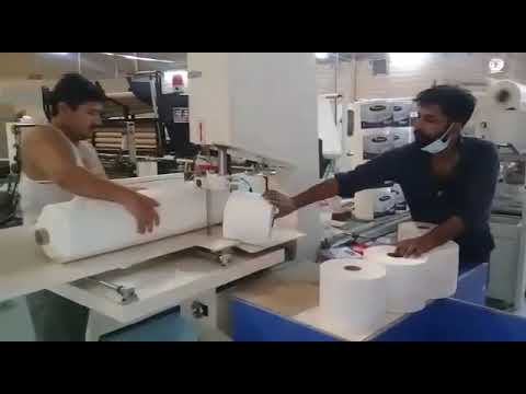 toilet tissue roll cutting machine