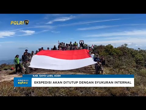 TIM EKSPEDISI POLDA ACEH SAMBUT HARI BHAYANGKARA BENTANGKAN BENDERA MERAH PUTIH DI GUNUNG LEUSER