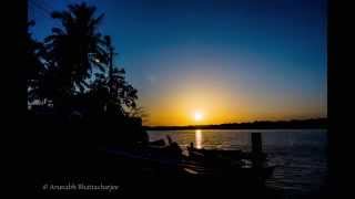 preview picture of video 'Time-lapse Video: The Vivid Colours of Goan Riverside Sunset'