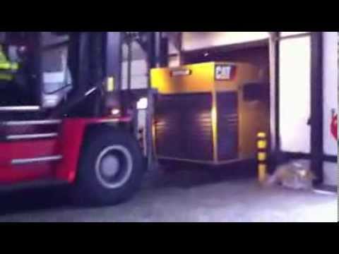 DPX | Loading Caterpillar 3412 generator set