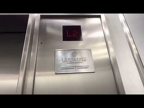 Cool Dover Traflomatic 4 low rise traction elevators, One Detroit garage, Detroit Michigan.