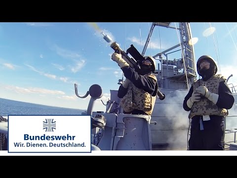 Firing the Fliegerfaust, a portable air defense weapon: when enemy aircrafts attack at sea