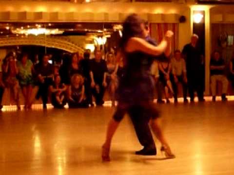  Silvina Valz  and  Oliver Kolker  are  dancing  to  the  tango  "  Dime Mi Amor  "
