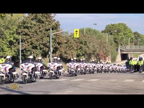 Toronto: Procession for officer Andrew Hong arriving from funeral...