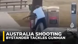 Download lagu Video shows bystander tackling and disarming one of the shooters at Sydney’s Bondi Beach mp3 Download lagu Video shows bystander tackling and disarming one of the shooters at Sydney’s Bondi Beach mp3