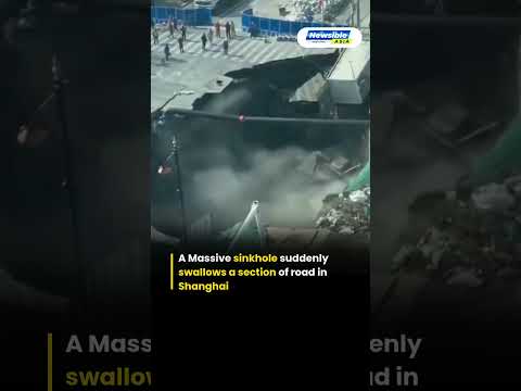 Shanghai Road Collapses Into Giant Sinkhole Near Metro Construction Site