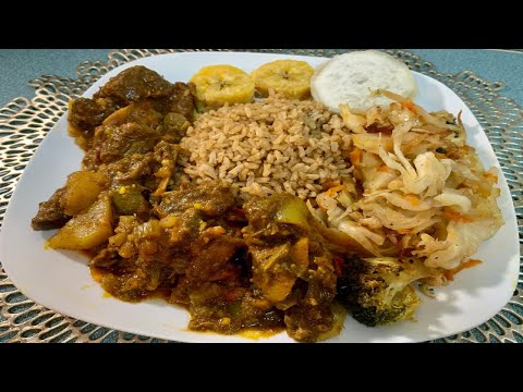 CURRY GOAT/ RICE AND VEGETABLES BAJAN STYLE