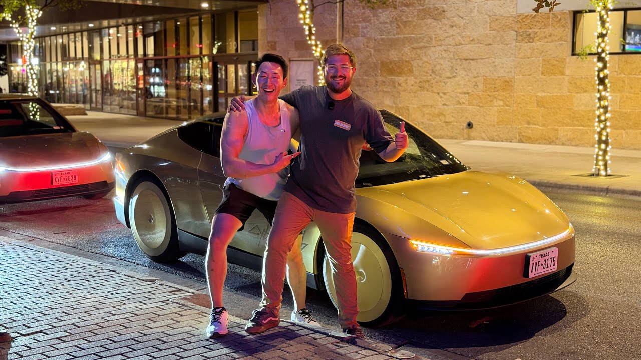Tesla Cyber Cab picking up passengers on a street in Austin, Texas