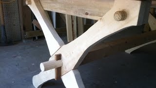 Build a table that is held together with 2 wedges and 4 dowels. Knock down furniture.Trade secret.
