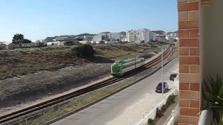 preview picture of video 'Sao Martinho do Porto, Portugal - Train with horn sound'