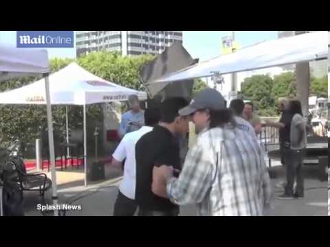 Mario Lopez celebrates the birth of his baby boy with cigars