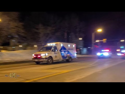 Toronto: Police + FD convoy escorting EMS with...