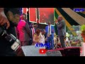 ZIPPORAH ERIC AND HUSBAND ERIC BEING DEDICATED BY THE MINISTERING CLERGY AT HER ALBUM LAUNCH