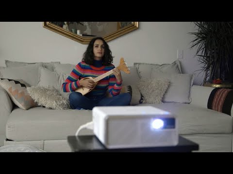 EF-100 Mini-Laser Streaming Projector with Android TV EF-100 Mini-Laser Streaming Projector with Android TV