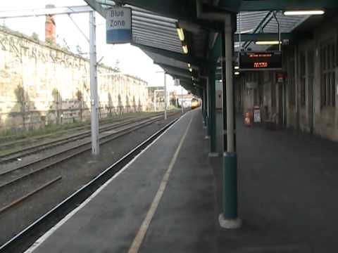 DRS 57003+57004 thrash through Carlisle on Nuclear Flasks.
