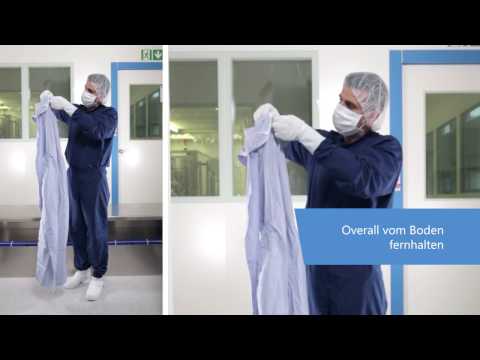 Korrektes Anziehen eines Overalls in einer Reinraum Schleuse