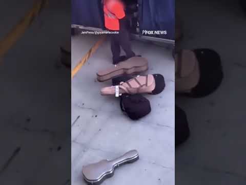 Baggage handler CAUGHT tossing guitars onto tarmac #foxnews #news #us #fox