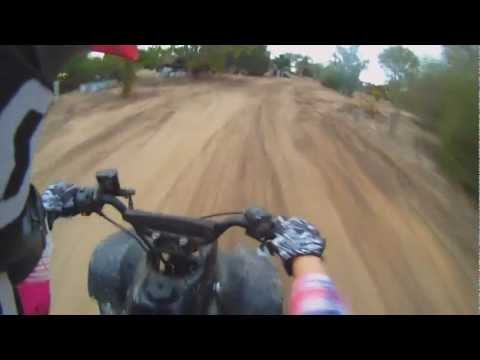 Fearless 9 year old rides quad bike
