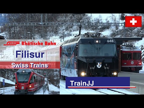 ▶ 4K Swiss trains in the snow | Bahnhof Filisur | RhB Rhätische Bahn| Albula Linie Schweiz