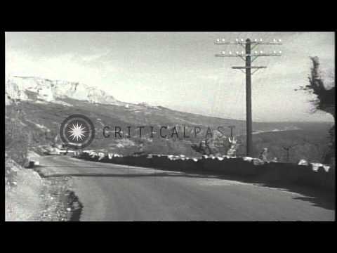 Soviet vehicles head for Livadia Palace where Yalta Conference is held during Wor...HD Stock Footage