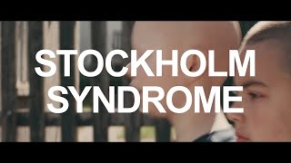 Kadr z teledysku STOCKHOLM SYNDROME tekst piosenki IDLES