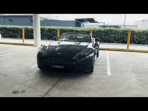 Driving Elegance: 2014 Aston Martin V8 Vantage S SP10 in Action!