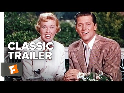 Trailer close-up: Doris Day and Gordon MacRae exchanging a playful look in a rehearsal room set