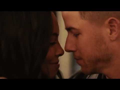 Trailer frame focusing on wedding imagery in warm light, echoing 'The Next Ten Minutes' duet