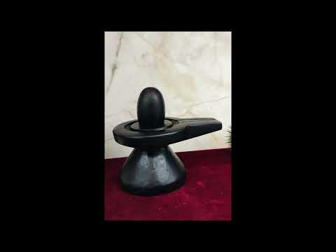 Black Narmadeshwar Lingam with NAtural Stone Yonibase video