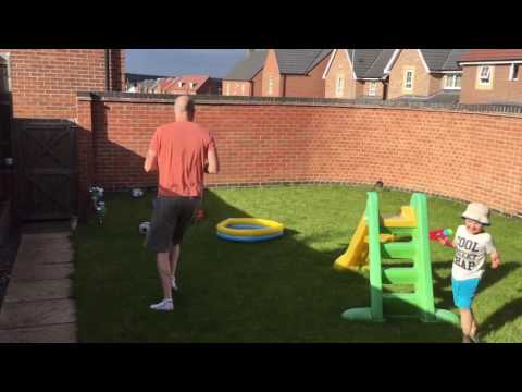 James chasing daddy and Sophie with water pistol