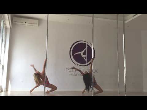 Pole dance double tricks - synchronized choreography to Phaeleh In the Twilight - pole fitness Dubai