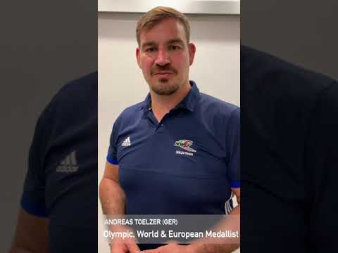 Andreas Toelzer supports Aris Leonidis