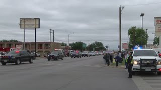 Slain Texas deputy's body returns to San Angelo as community mourns
