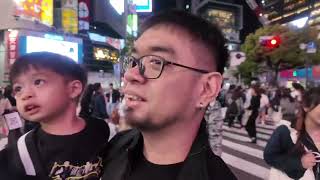 Walking in the famous Shibuya Crossing with our kids.