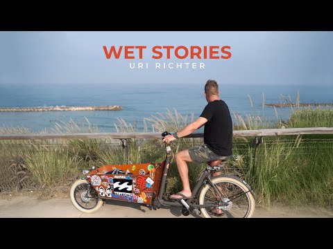 Wet Stories- A docu-mini-series that tells the stories of the people behind the lens. logo