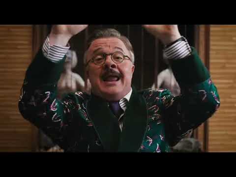 Trailer montage hinting at a big tap-and-lounge sequence and a hip-hop office routine