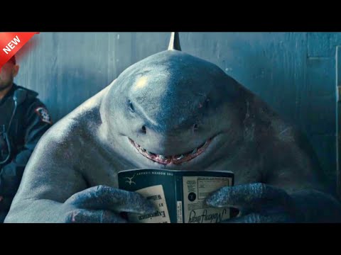 King shark tries to read book . Explained in hindi