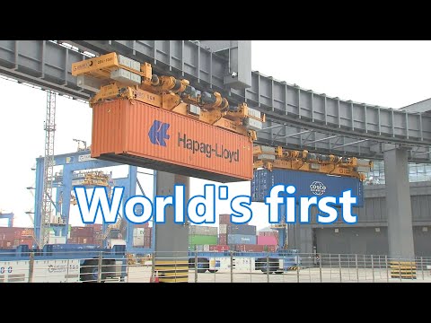 World's first smart container transport system put into use at east China's Qingdao Port 全球首個智能集裝箱運輸
