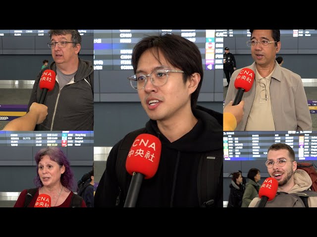 Passengers at Taoyuan Airport react amid China military drills around Taiwan