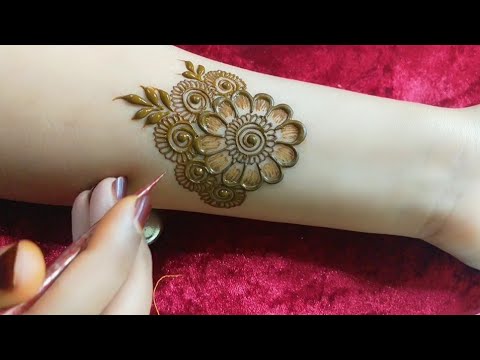 floral arabic mehndi design for front hand by tais mehndi designs