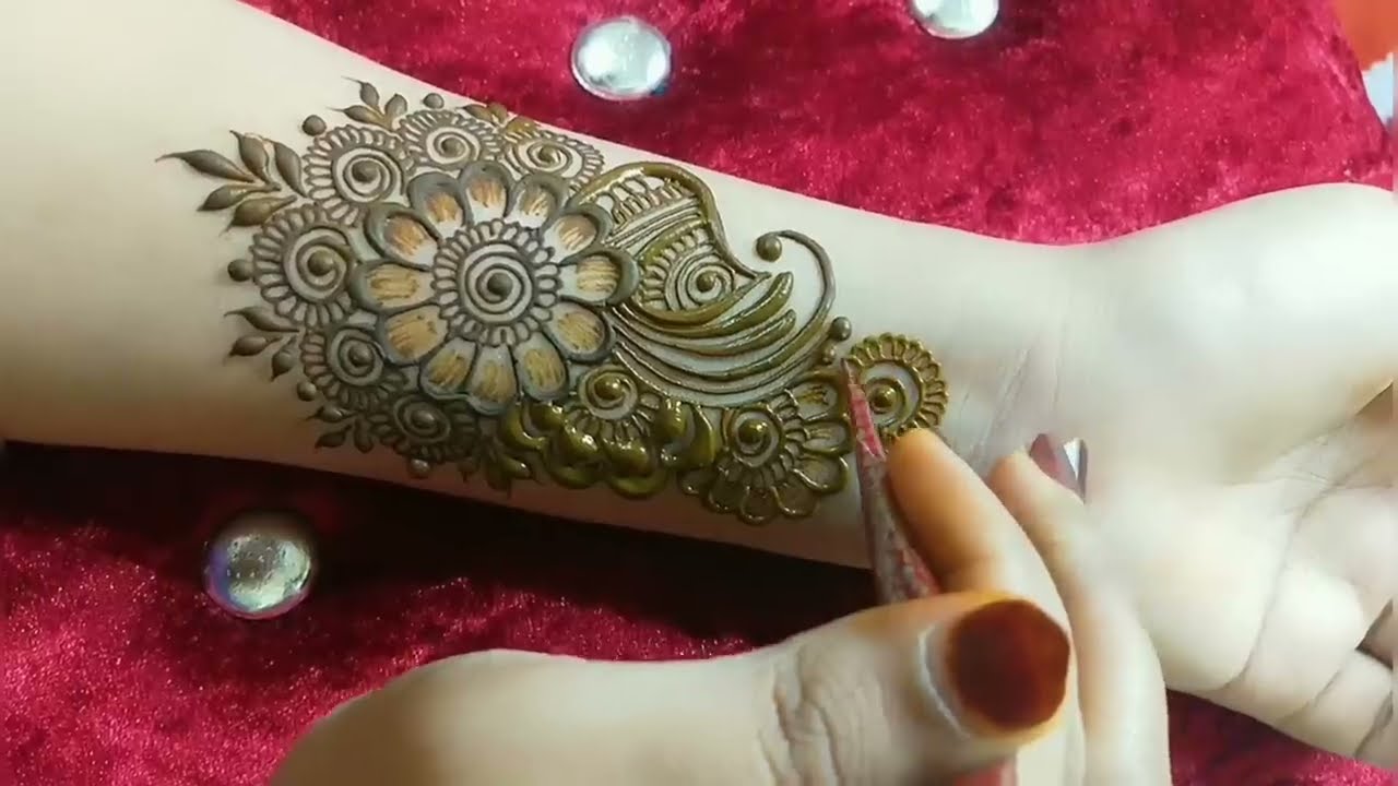 floral arabic mehndi design for front hand by tais mehndi designs