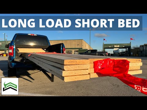 Part of a video titled How To Haul 16 Foot Boards In Your Truck - YouTube