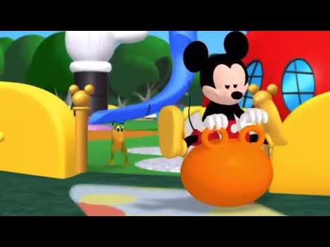 Mickey bouncing on a orange hoppity ball