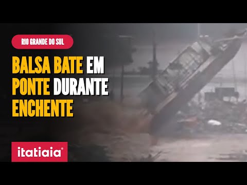 CHUVA NO RS: ENCHENTE FAZ BALSA BATER EM PONTE
